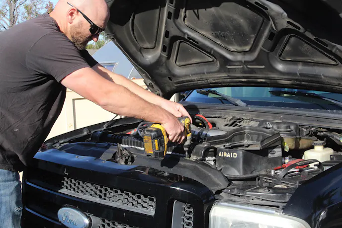 image of upper radiator brackets being removed