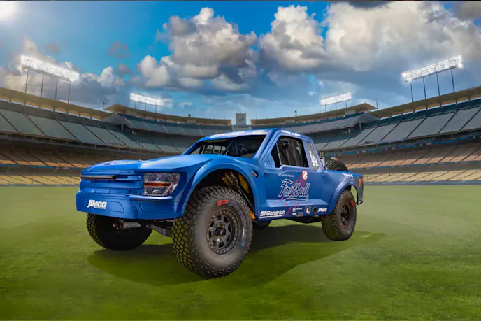 LA Dodgers Bobby Patton of Fastball Racing Swings Jimco Trophy Truck