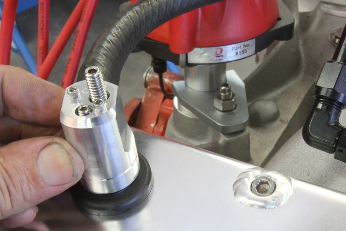 oil on spark plug threads