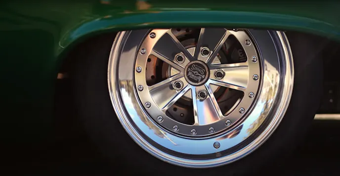 Custom Mawer inspired wheels enclosing disc brakes all around.