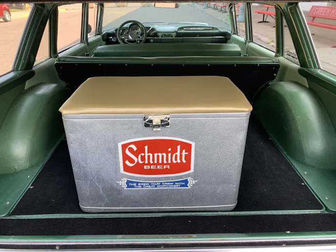 Schmidt beer cooler in back of a 1960 Chevy Parkwood station wagon.