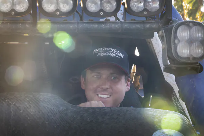 Luke McMillin has a lot to smile about at the finish line.