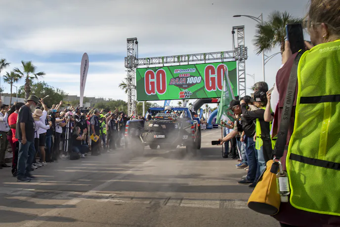 The coutdown on the jumbotron screen glows green and says GO when it's time to race.