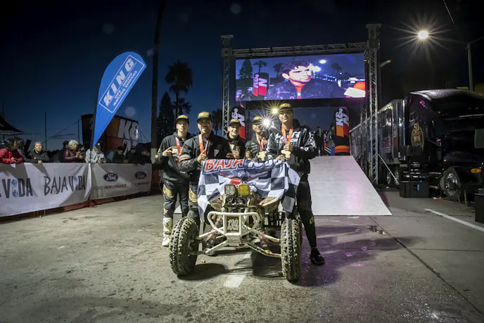 Friends and families from all nationalities join together to compete in the Baja 1000.