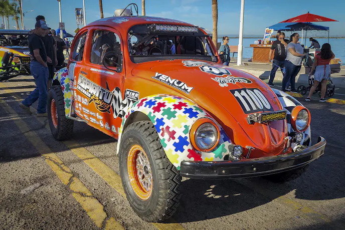 This colorful Class 11 bug takes its turn waiting in line for tech inspection.