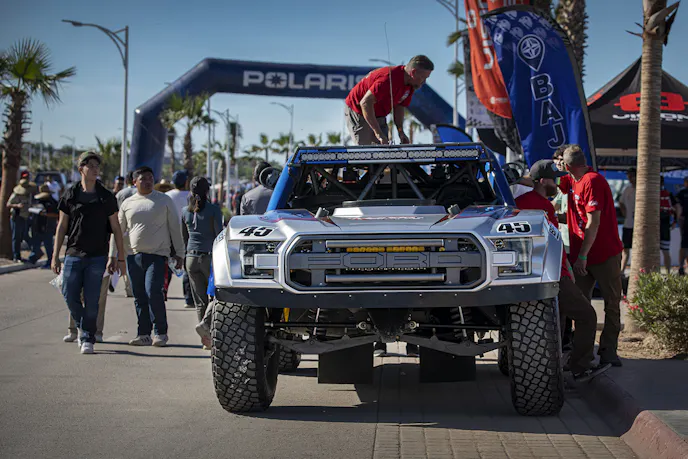Team #45, along with their Ford F-150 trophy truck, gets themselves ready for the race.