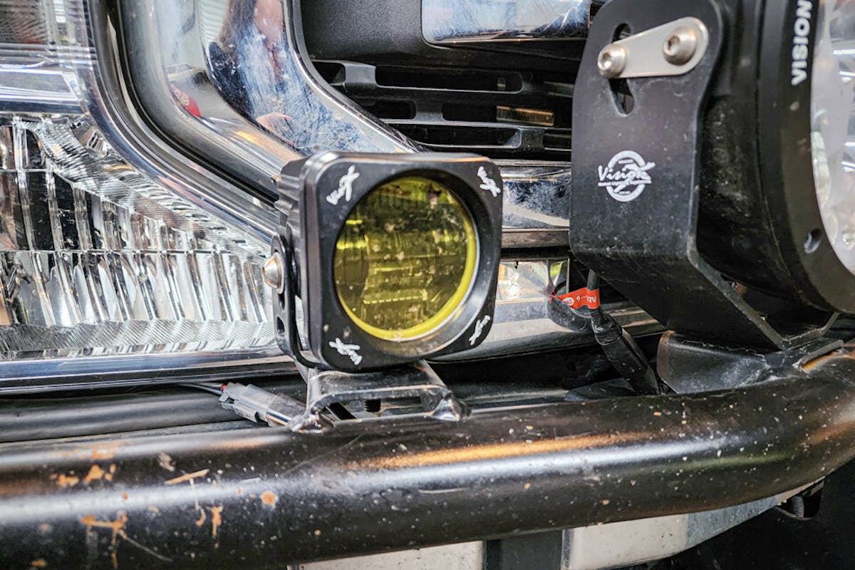 Amber spots are used in conjunction to large white auxiliary driving lights