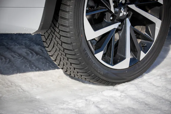 The Yokohama BluEarth snow tires showcasing strategically placed 3D sipes to enhance snow and ice traction.