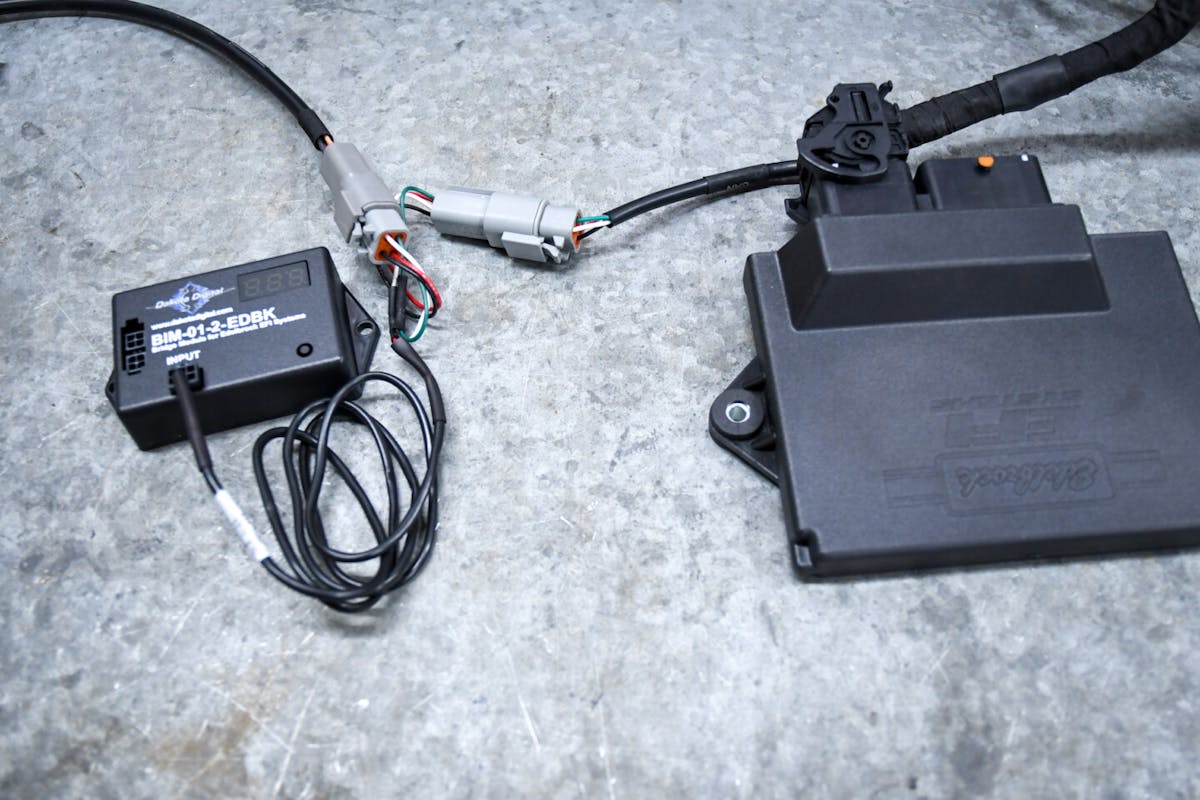 Dakota Digital BIM module connected to Edelbrock ECU