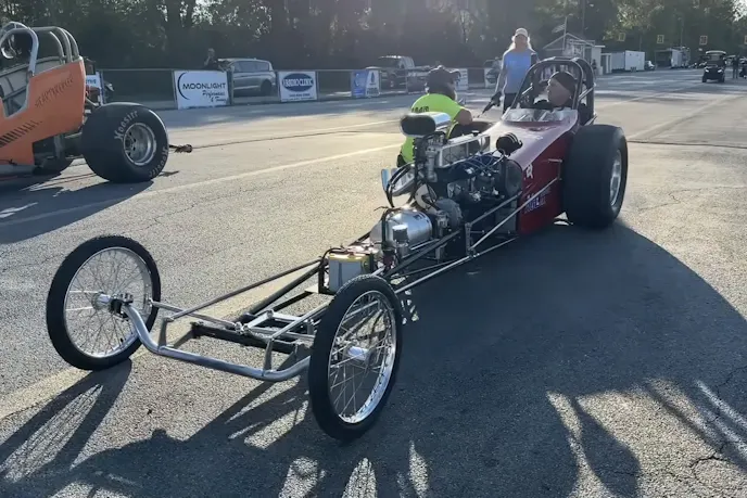 a car with a front engine, inline six cylinders