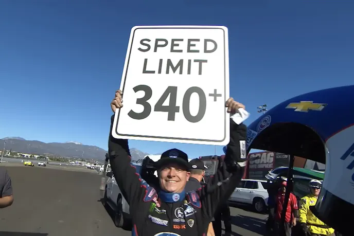 Prock raises the "speed limit 340" signage 