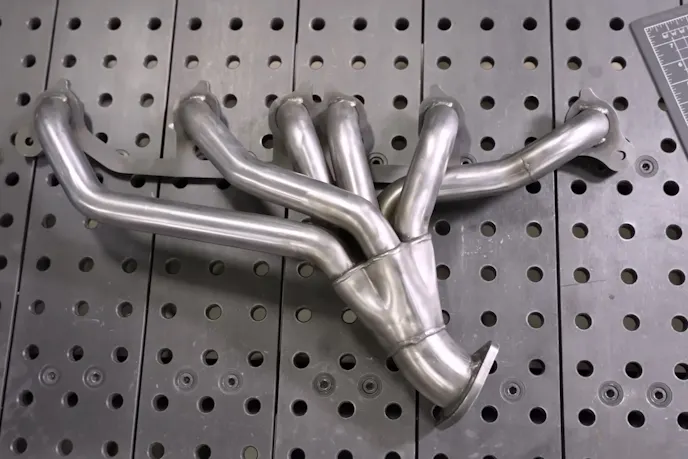 design that reduces exhaust back pressure