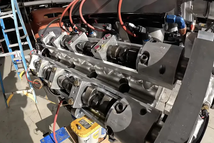 cam boxes created by pete and kevin for the five-cam chevy 350