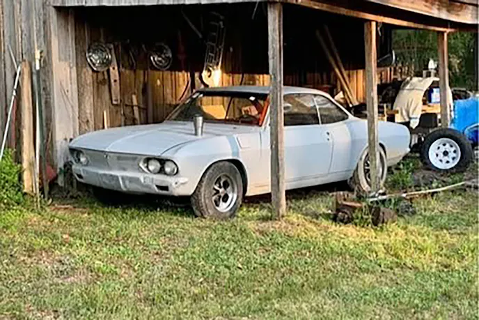 Corvair in a barn