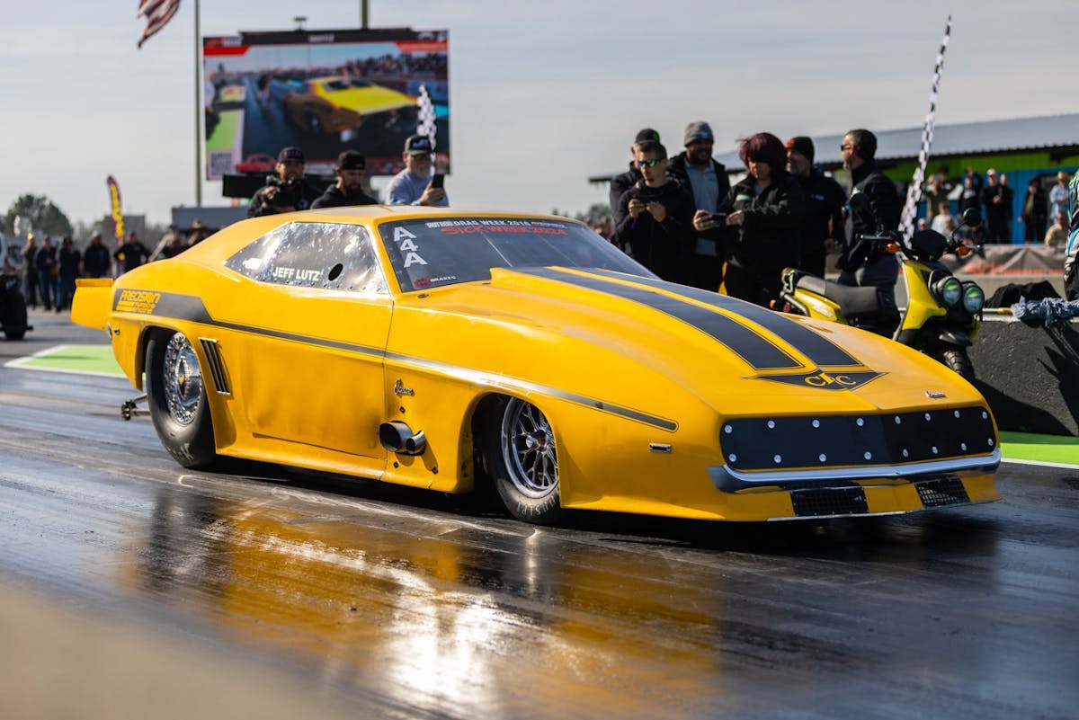 sick week yellow and black racing car