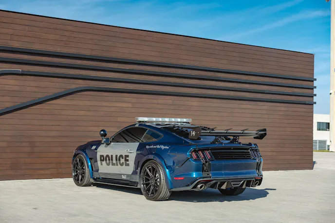 Back view of Barricade Mustang