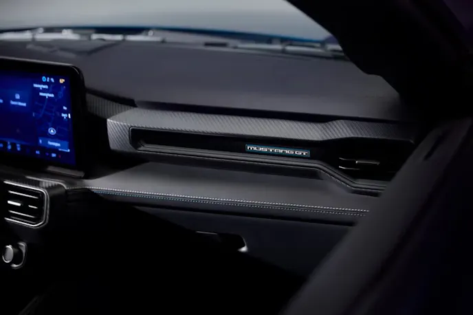 Mustang GT badge on the passenger side dashboard