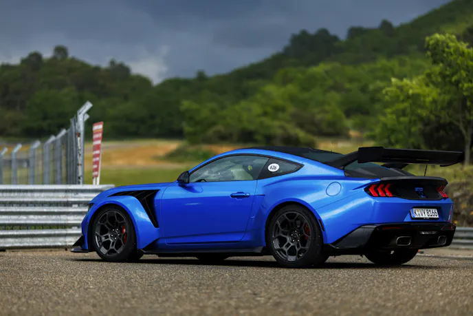 Lightning Blue Mustang GTD heading to the track