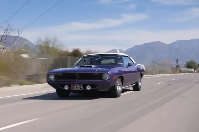 Jay Leno Driving a Classic Car