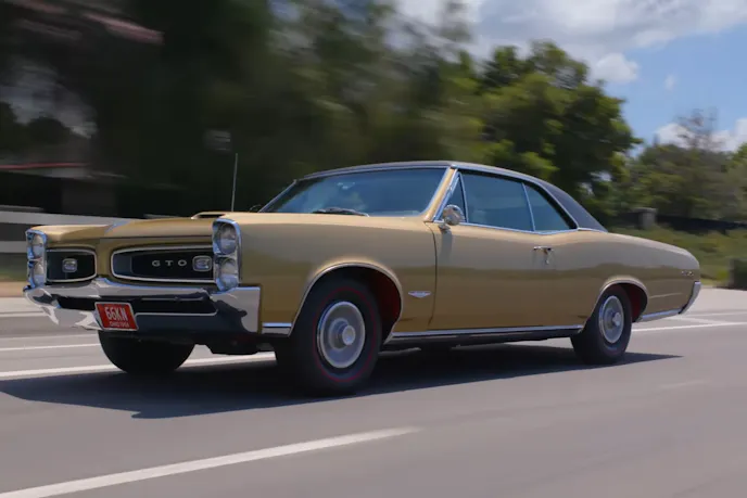 Jay Leno Driving a Classic Car (3)