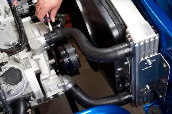 Moving the inlet and outlet to match the port direction on the water pump can greatly simplify radiator hose selection and create a clean installation. This also makes it easier to find pre-formed hoses that will fit well.