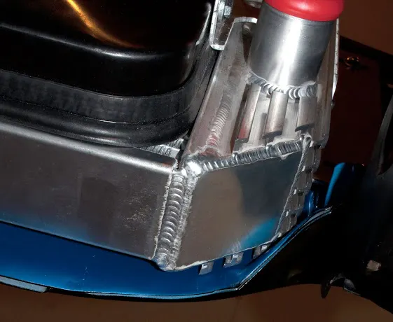 There is a host of options available from Flex-a-lite to make the radiator fit your engine swap needs, including angling the bottom of the side tanks to fit snugly in the chassis.