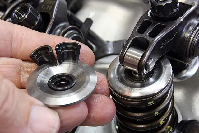 Valve locks must be matched to a specific valve stem diameter. When the locks are correct, there will be a small gap in between the two halves. If there is no gap, the valve diameter is too small or the locks are for a larger valve stem. Note the step in these locks. These are designed to accommodate a lash cap that fits over the end of the valve.