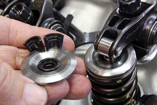 Valve locks must be matched to a specific valve stem diameter. When the locks are correct, there will be a small gap in between the two halves. If there is no gap, the valve diameter is too small or the locks are for a larger valve stem. Note the step in these locks. These are designed to accommodate a lash cap that fits over the end of the valve.