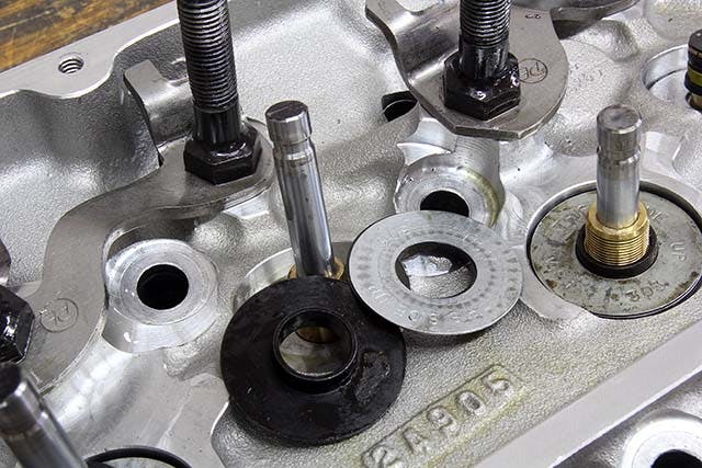 Shims can be used to dial in the installed height. Thinner shims should be placed at the bottom. If combined with a spring cup, the spacers should be placed under the cup to allow the guides to help locate the spring.