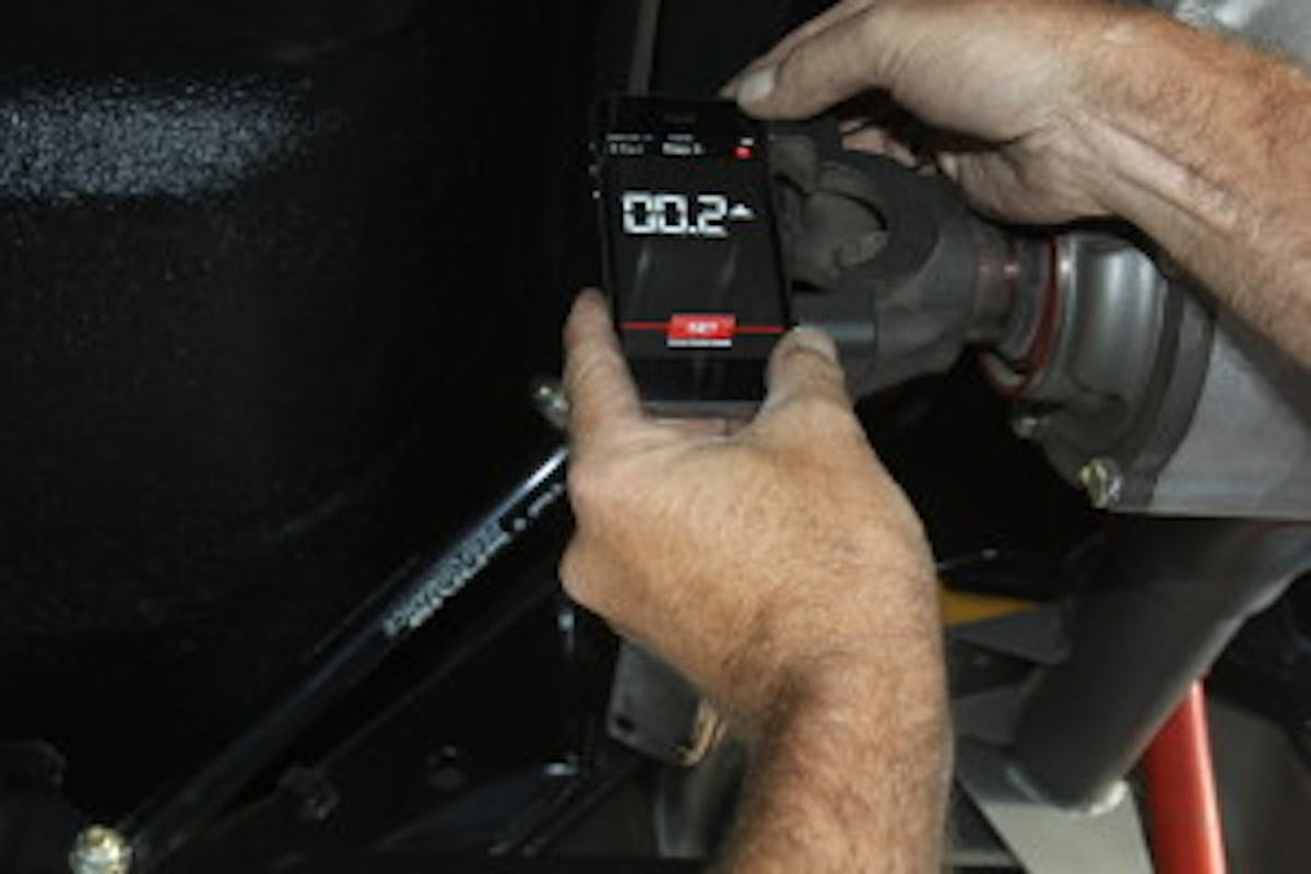 Scott’s Chevelle is equipped with a 9-inch rearend, so we measured the vertical machined end of the pinion flange to get the pinion angle. Note that at ride height the rearend is nearly flat, with only a slight 0.1-degree nose down angle. The degree arrow always points in the direction of increasing the angle. The angle tells us that the pinion angle opposes the engine/trans angle –at only 0.1 degree, but still an opposing angle.