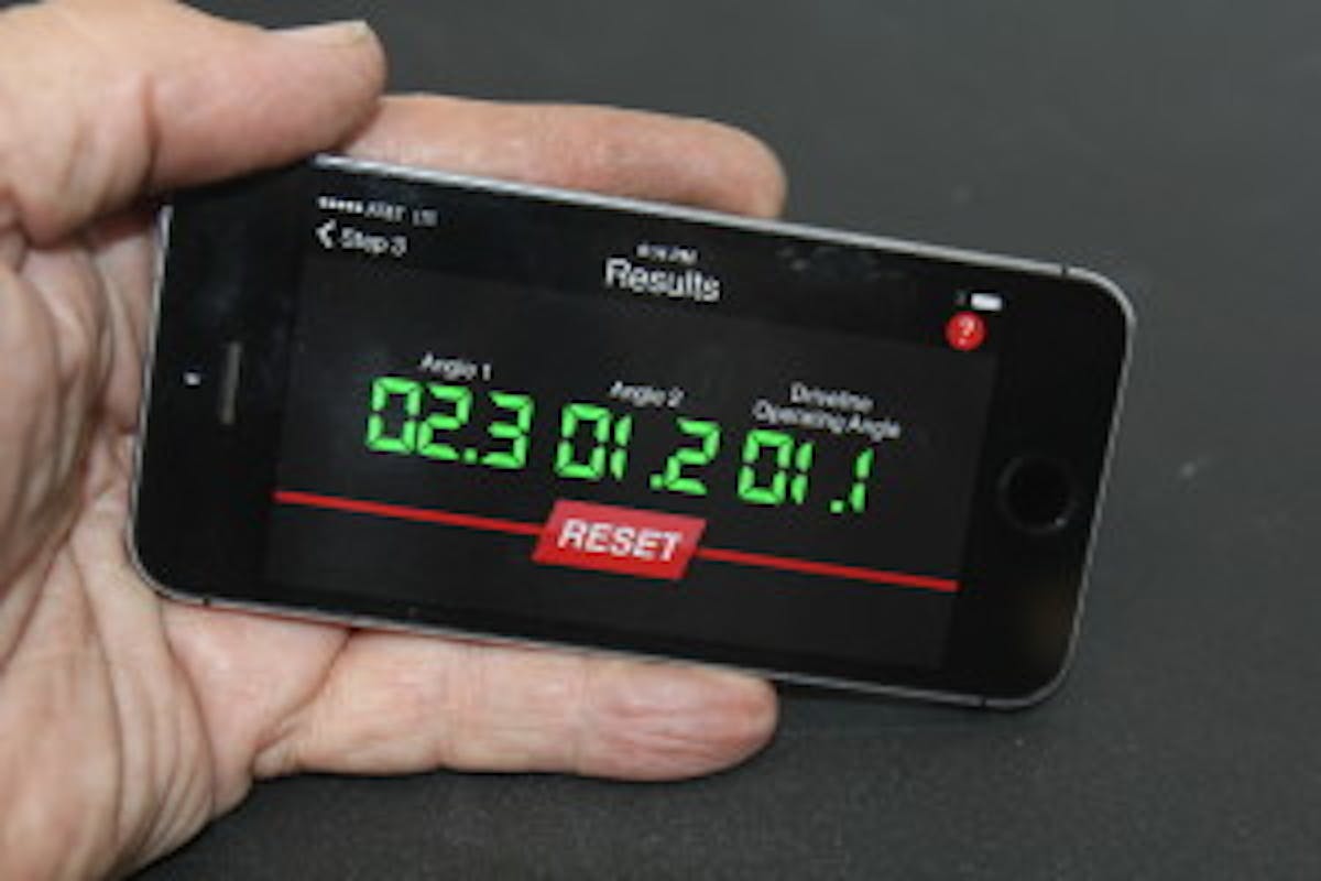 We reassembled the rear arms and then ran through the entire test procedure a second time with better results. We increased the upper control arm length which pushed the pinion to a nose-up position by over a degree. This created a better overall driveline operating angle. Subtracting Reading 2 from Reading 1 produced an Angle 1 of 2.3 degrees (green) and our Angle 2 was also in spec now at 1.2 degrees which produced an in-spec total operating driveline angle of 1.1 degrees and all is right with the world.