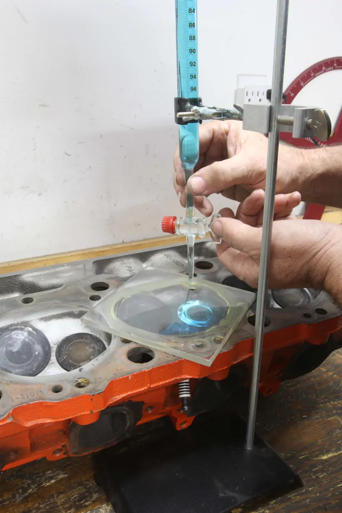 The only way to accurately know the volume of a combustion chamber is to measure it with a burette. Note that burettes are graduated in milliliters, but 1 milliliter (ml) equals 1 cubic centimeter (cc) so they are effectively the same.