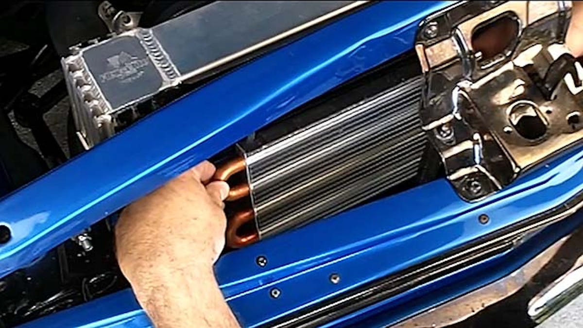 Installing a quality transmission oil cooler in practically any car or truck is quite easy with Flex-a-lite's modular kit designed to mount their small-but-efficient Translife cooler to a Flex-a-fit radiator.