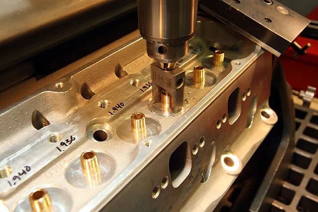 To operate most efficiently, each valve must exert the same pressure on its valve. To do this the installed height on every valve must be equal. A good cylinder head specialist will mill the spring pockets in his cylinder heads so that they can be shimmed to get exactly the installed height the valvetrain requires.