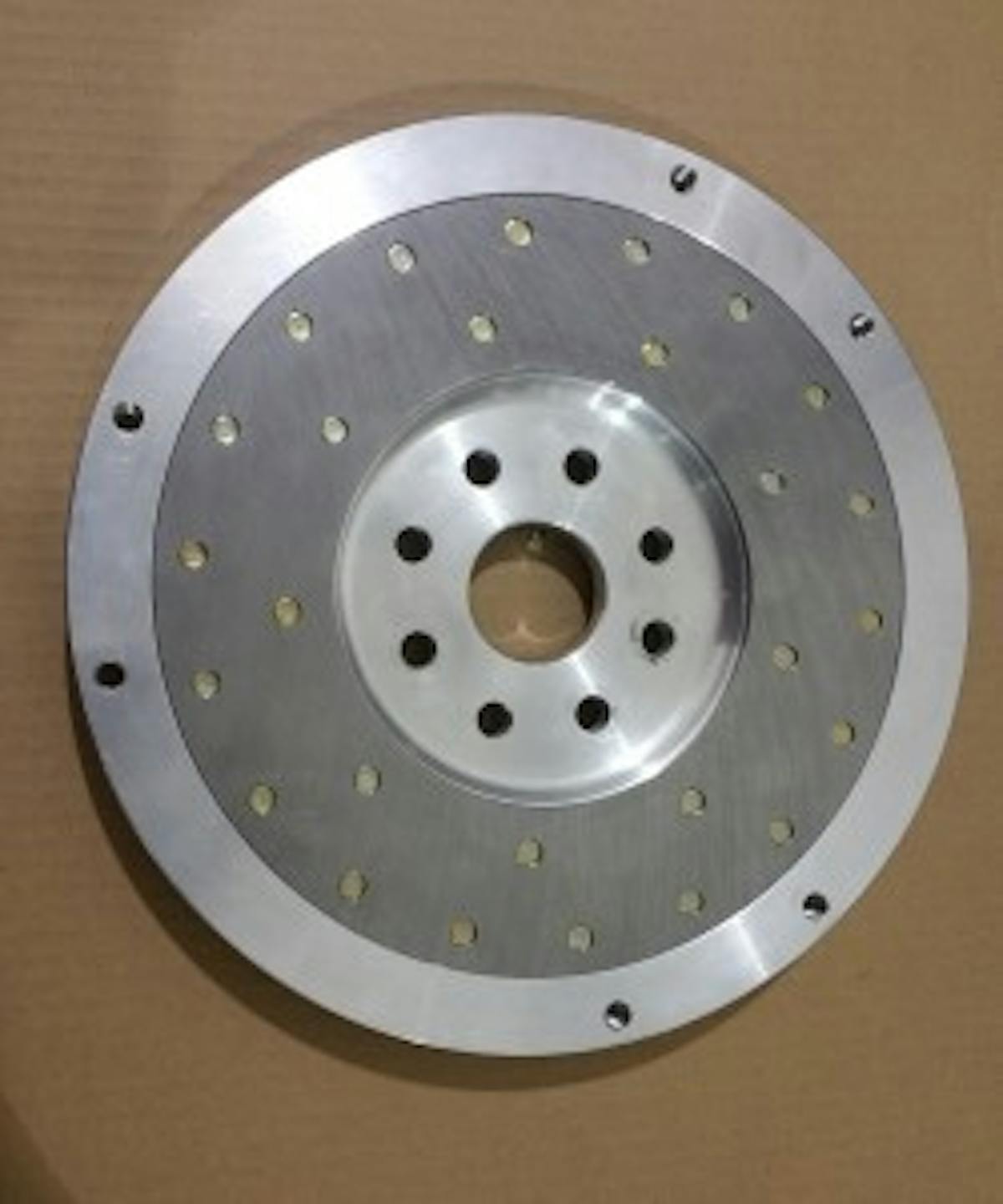 Clutch side of Alum. Flywheel has steel facing for 11 in. Long Presure plate.