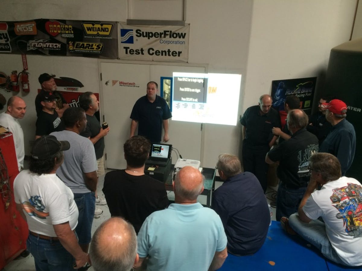 This is a quickie photo taken by my pal Richard Holdener as David Page illustrates changes to the engine running an EZ-EFI throttle body on a small-block on the dyno. The class was held at Westech Performance with help from Rick Stoner, Steve Brule and crew. 