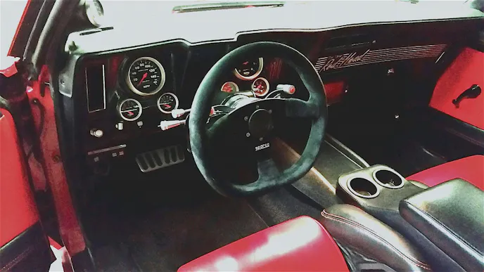 The interior sports all the necessities of a purpose-built street machine/race car, along with those steering wheel mounted paddle shift-ers that deliver high speed gear changes.