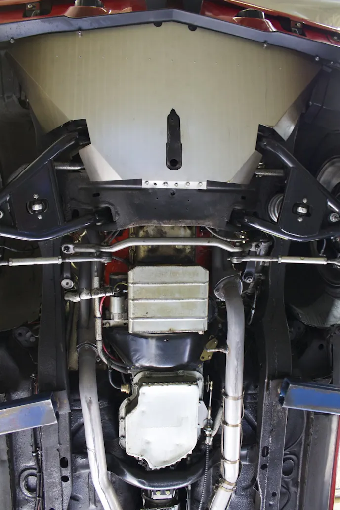 Front suspension upgrades include tubular A-arms, frame connectors, and sealed lower radiator ducting.