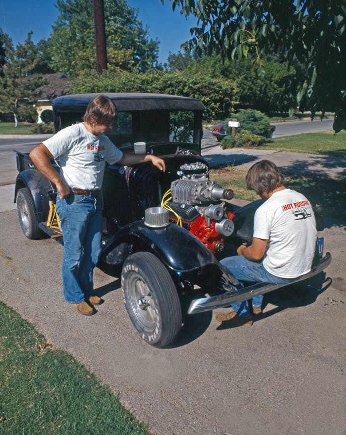 A classic driveway scene, Lee Kelley, left, with long time friend Lenny Emanuelson, who was to follow Lee as editor of Hot Rod in 1981. This ’32 Ford truck was well known to hot rodders back in the day.