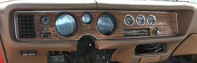Our ’71 Pontiac dashboard looked its age with well-worn gauges, bezels, and dashboard fascia. On top of that, the factory forgot to add some of the most basic engine instrumentation, so it was our charge to transform the instrument panel into a respectable read out.