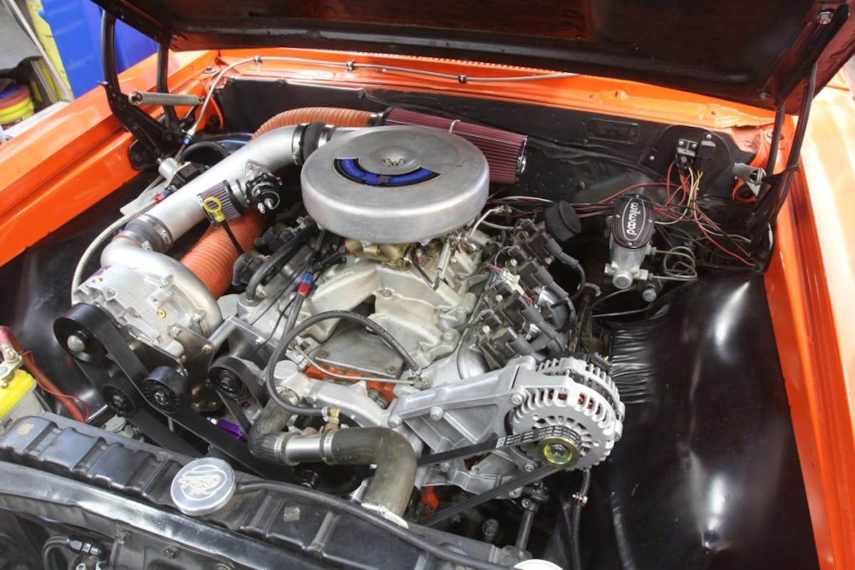 This is the Vortech supercharger installed on the little 4.8L truck engine in my Orange Peel Chevelle. The flexible hose for the air inlet is temporary until I can talk my fabricator buddy into making an aluminum tubing inlet package. I’ve found some nice parts offered by Spectre that should work.