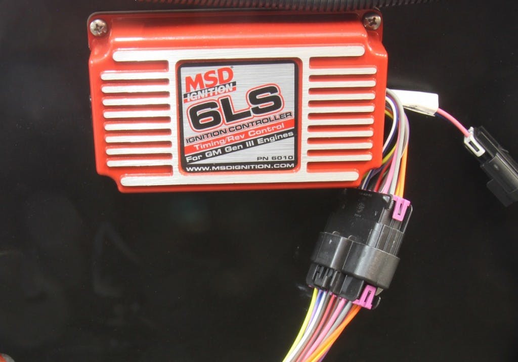 MSD makes converting to a carburetor really easy with this 6010 box for the early 24x LS engines and the 58x engines, as well. The free MSD software allows you to set your ignition curve — or simply plug a two-pin piece in the side of the box that has a pre-determined ignition curve. It doesn’t get much easier.