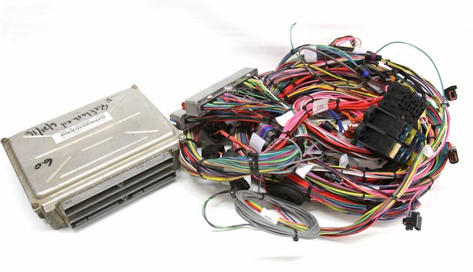 If you plan on using a stock computer, an aftermarket wiring harness is a wise investment, as the factory harness is cumbersome. This is a Painless harness for a 2000 LQ4 iron truck 6.0L engine and computer. 