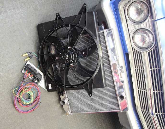Installing a big electric fan and relays isn’t difficult and doesn’t have to be expensive. This new MK8 fan from RockAuto and three-relay kit from Hollister Road offers excellent two-speed electric fan control that should be more than enough to cool most street cars. Best of all, this whole package will run roughly $220.