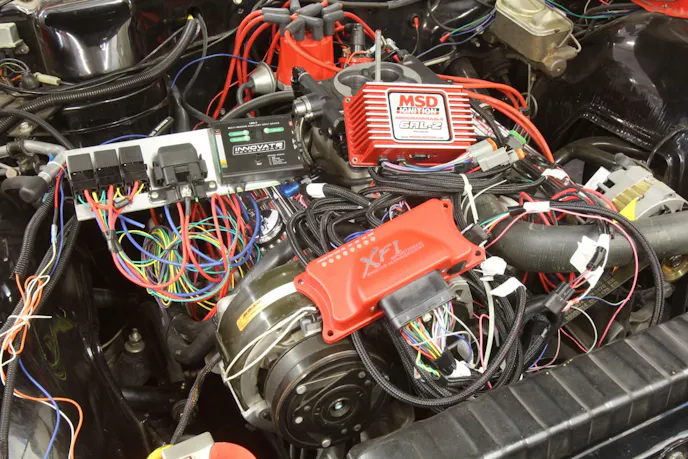 As digital controllers for fuel and spark become more popular on custom-built performance cars, it’s very easy to fall victim to RFI/EMI interference. We’ll take a look at some ways to avoid the major electronic noise land mines that are secretly buried in your engine compartment.