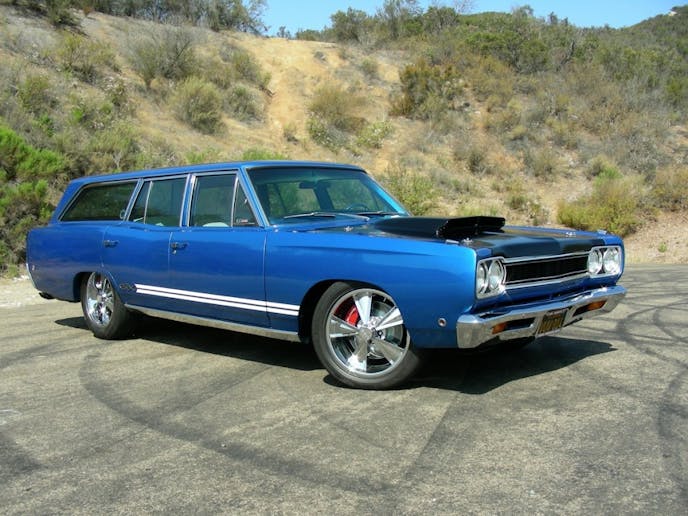 The stance of the GTX 440 Six Pack Wagon makes no bones about its purpose. Sitting slightly lower than stock, it still stands tall and imposing compared to today’s low-slung cars. Period perfect Cragar S/S wheels complement the vintage appearance of the wagon, complemented by Firestone Firehawk Indy 500 performance radial tires.