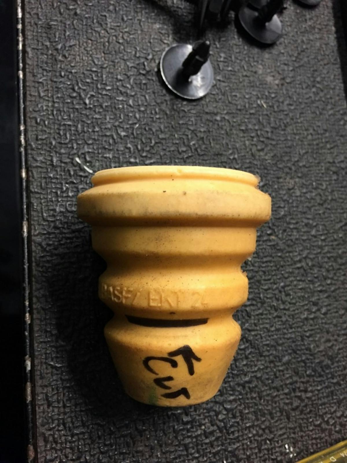 The rear bump stops are cut down one inch to provide extra suspension travel during hard acceleration and then mounted on the rear end. Mike Beavers noted this was a critical step in getting the Charger to launch.