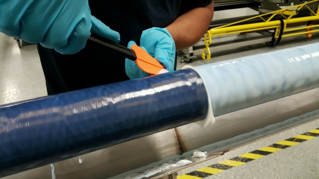 As the carbon fiver strands are wrapped carefully to form the shaft, 3M resin is applied to make it strong. Today, QA1 makes driveshafts in diameters of 2.7, 3.2 and 3.7 inches.