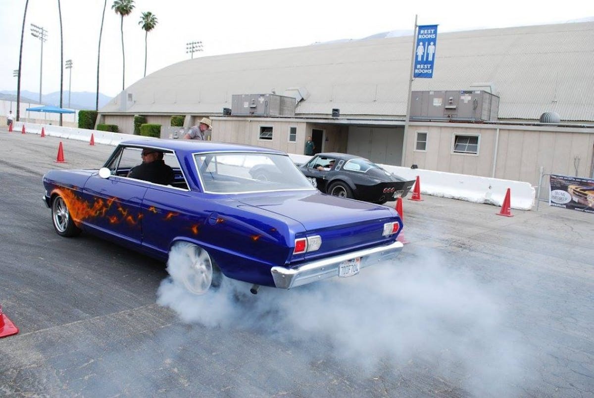 Lighting up the tires prior to a stop box run - in preparation for the burn out contest to come.