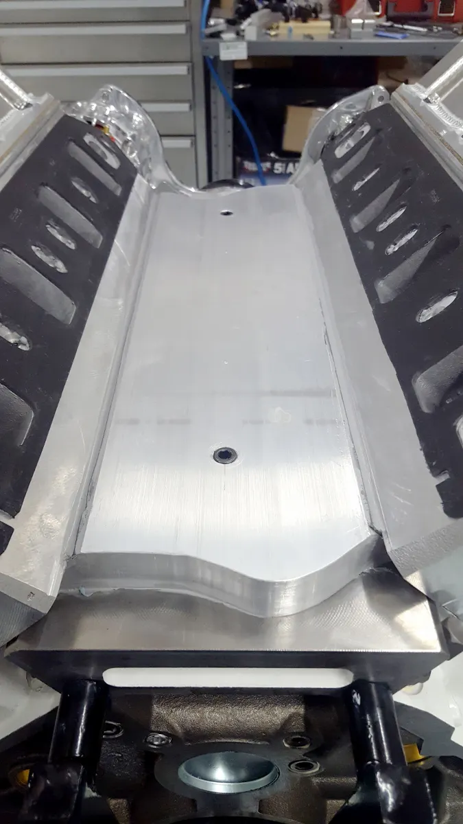 The tall heads also requires a spacer to cover the lifter valley that will be supplied with each set of heads.